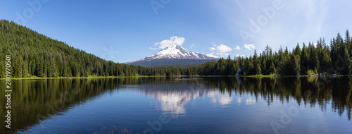 Beautiful Panoramic Landscape View of a Lake with Mt Hood in the background during a sunny summer day. Taken from Trillium Lake, Mt. Hood National Forest, Oregon, United States of America.