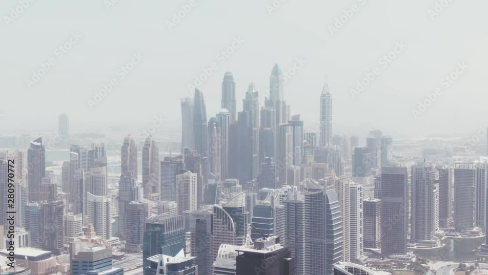 Aerial Drone Helicopter shot of the Skyscrapers of Dubai Marina on a bright and sunny day Aerial Drone Helicopter shot of the Skyscrapers of Dubai Marina on a bright and sunny day