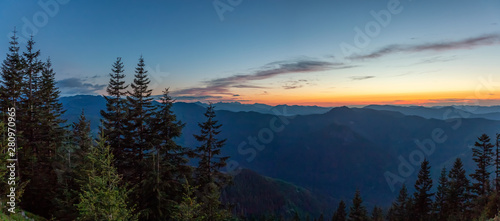 Beautiful Panoramic View of American Mountain Landscape during a vibrant and colorful summer sunset. Taken from Sun Top Lookout, in Mt Rainier National Park, South of Seattle, Washington, USA.