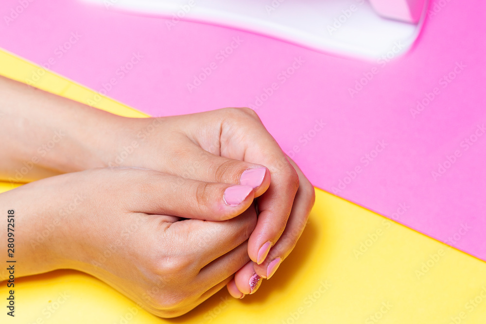 Female's hands after manicure procedure. Concept of nail polish art or shellac Female's hands after manicure procedure. Concept of nail polish art or shellac