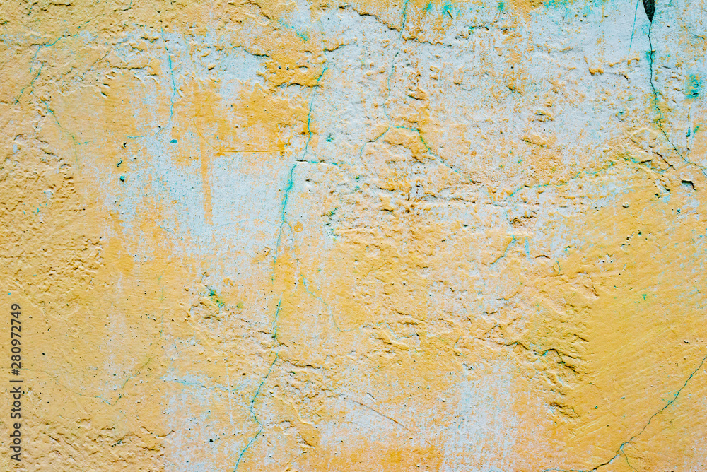 Texture of a concrete wall with cracks and scratches which can be used as a background