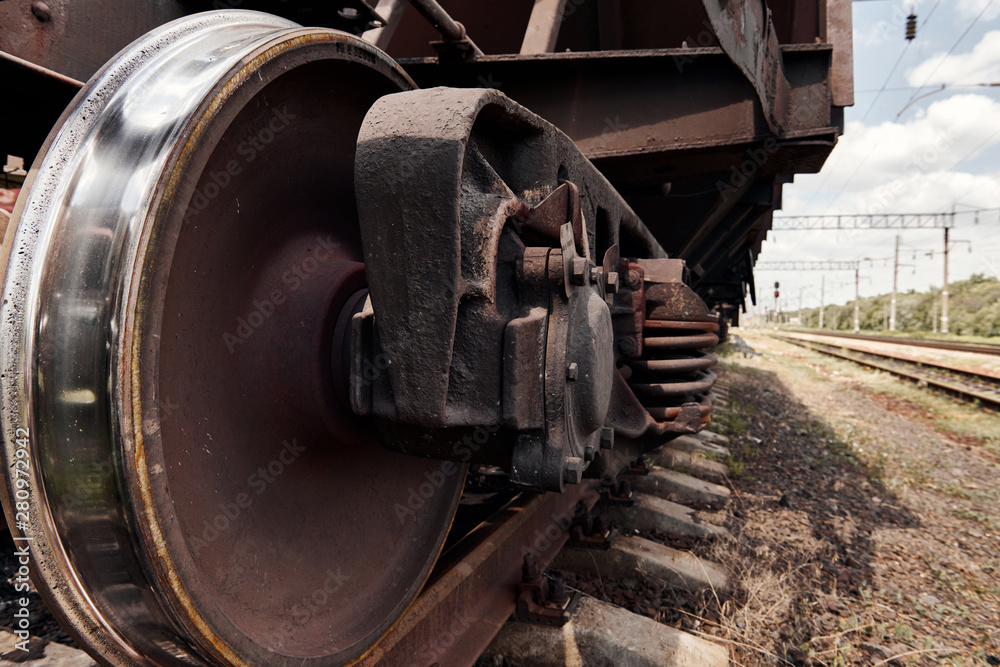 chassis, wheels of a railway car, rails - the concept of transportation and shipping
