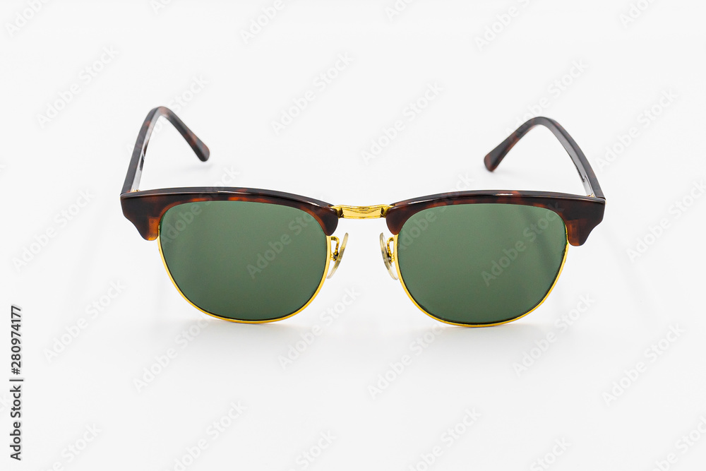 beautiful high quality sunglasses stylish on white background with shadow studio  isolated stuff idea for long weekend holiday travelling in summer season vocation  protect eyes from sunlight top view