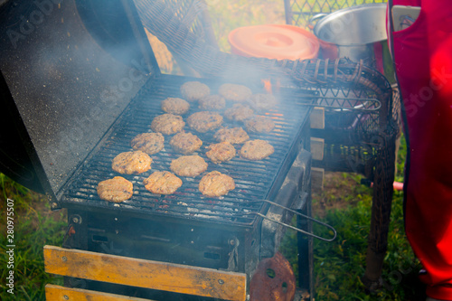 Meat and vegetables cooked on a barbecue