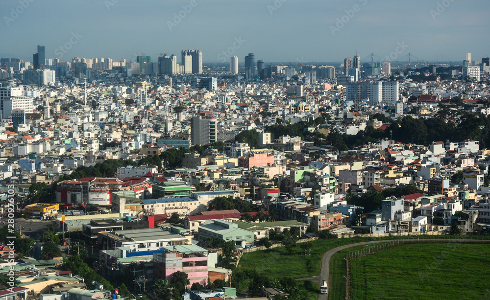 Aerial view of cityscape in sunny day