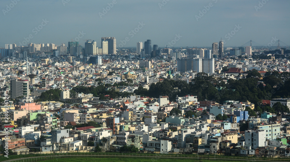 Aerial view of cityscape in sunny day