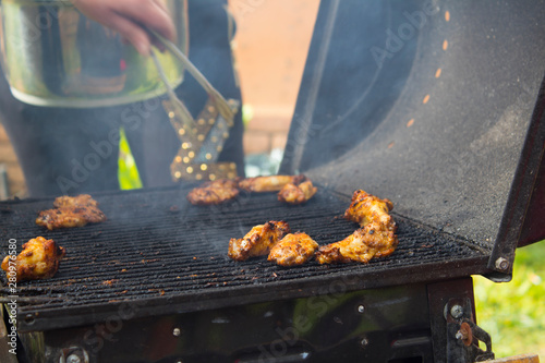 Meat and vegetables cooked on a barbecue