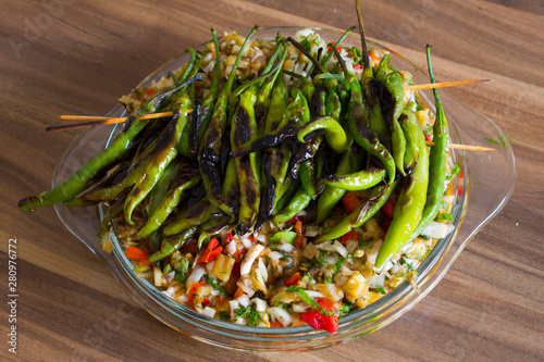 Roasted peppers on vegetarian salad