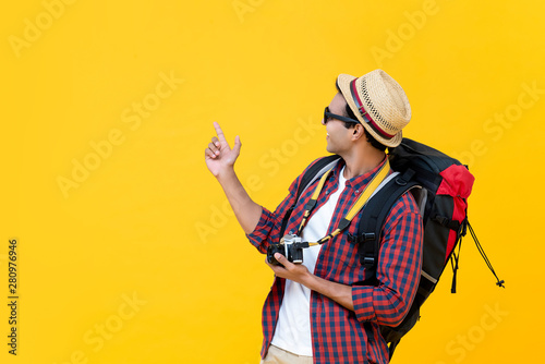 Asian backpacker being enjoyed with his travelling