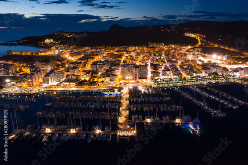 Aerial view of city port at night.