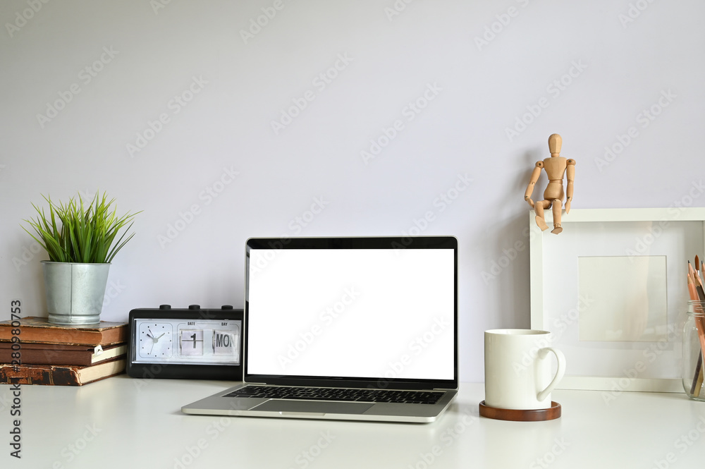 Mockup computer laptop on workspace with empty screen. Mockup computer laptop on workspace with empty screen.
