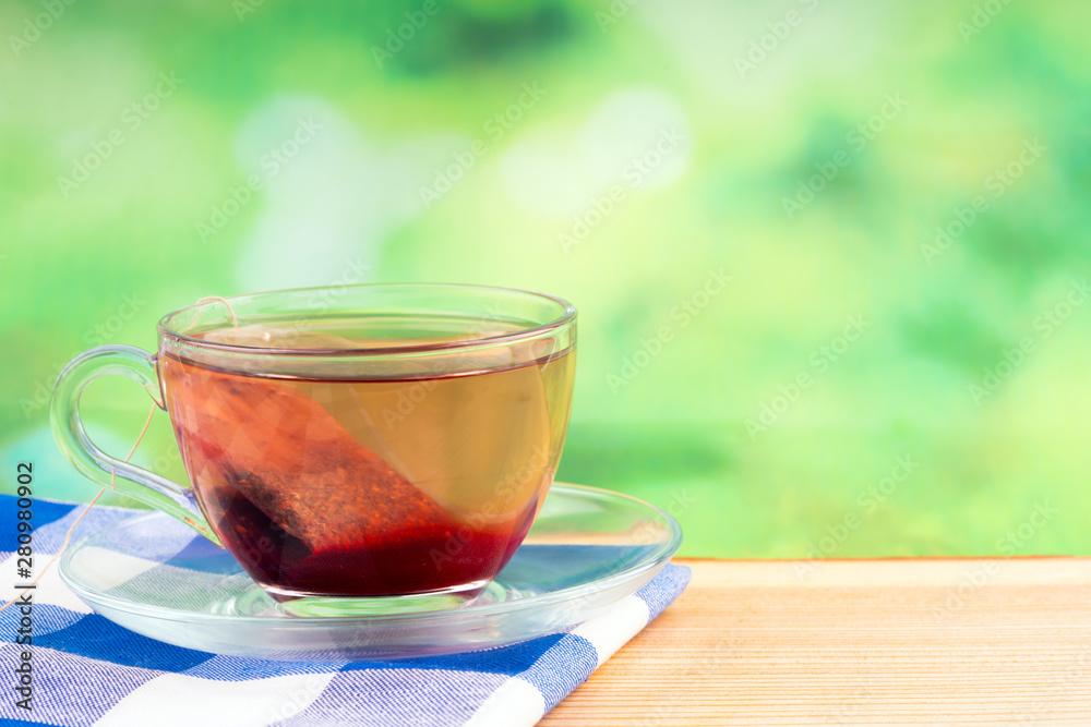 herbal tea bag and green background herbal tea bag and green background