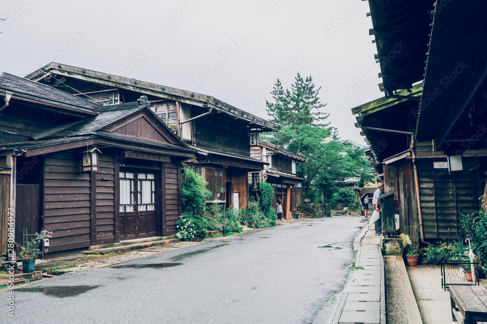 Kiso valley is the old  town or Japanese traditional wooden houses for the travelers walking at historic old street  in Narai-juku , Nagano Prefecture, JAPAN.