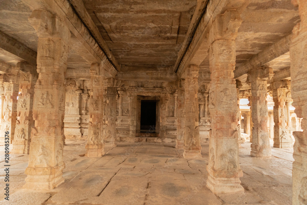 Stone piller showing of ancient architecture inside the ruined krishna temple at Hampi, India