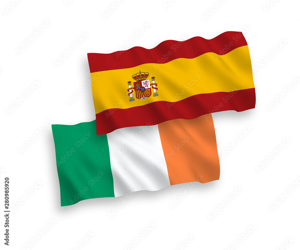 National vector fabric wave flags of Ireland and Spain isolated on white background. 1 to 2 proportion. National vector fabric wave flags of Ireland and Spain isolated on white background. 1 to 2 proportion.