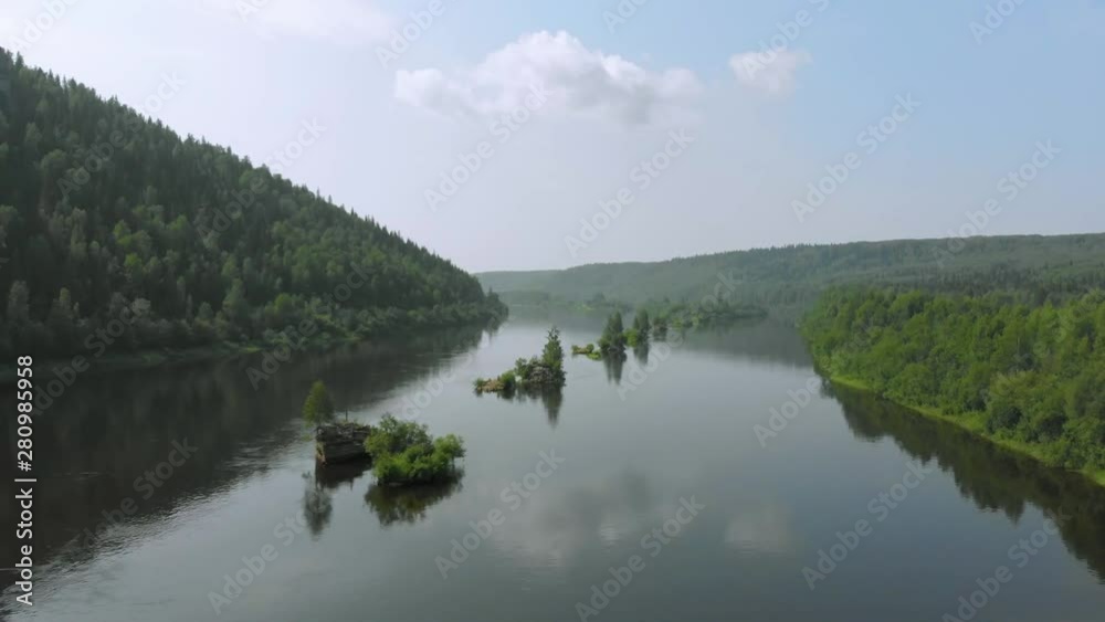 Rock Vetlan over the river Vishera in the sunny morning Rock Vetlan over the river Vishera in the sunny morning