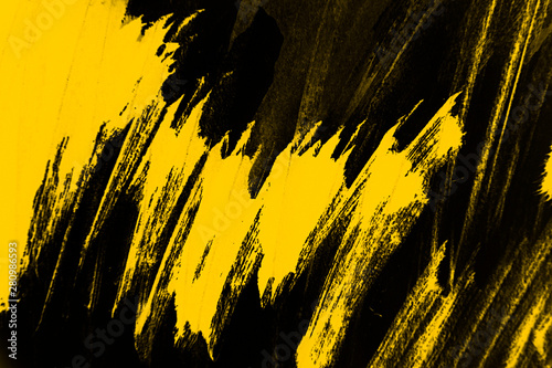 yellow and black paint  background texture with brush strokes
