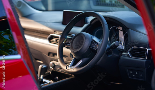 Vehicle interior of a modern car with steering wheel