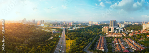 Panorama wide angle view cityscape,green park,terrace house and highway located at Kuala Lumpur,Malaysia . © jamesteohart