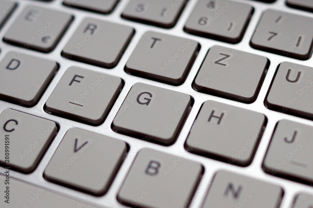 Nahaufnahme einer Tastatur für einen Computer Nahaufnahme einer Tastatur für einen Computer