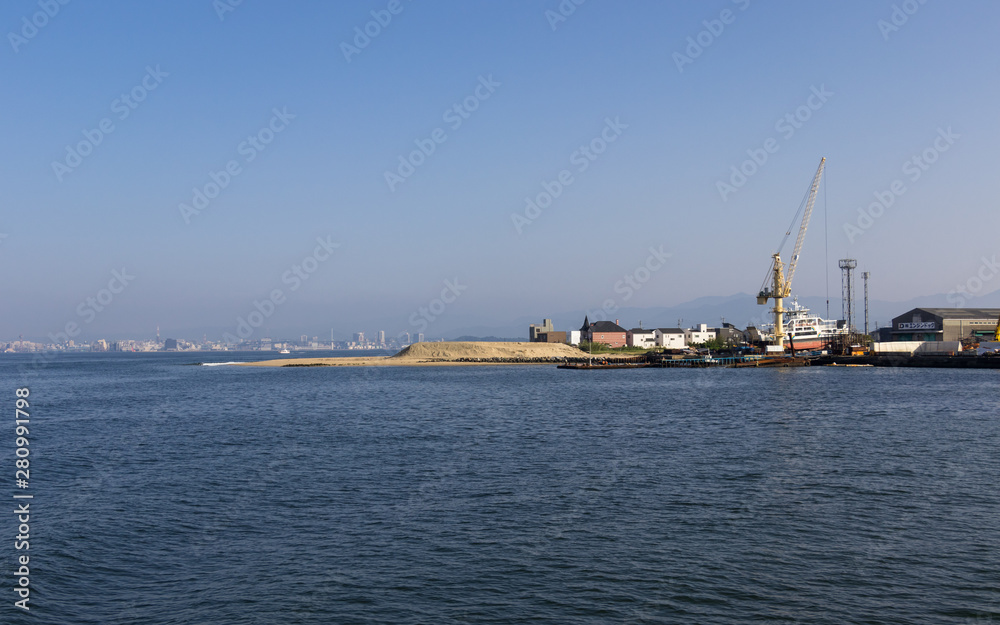 Saitozaki Industrial Harbor with Buildings. Higashi, Fukuoka, Japan. Asia