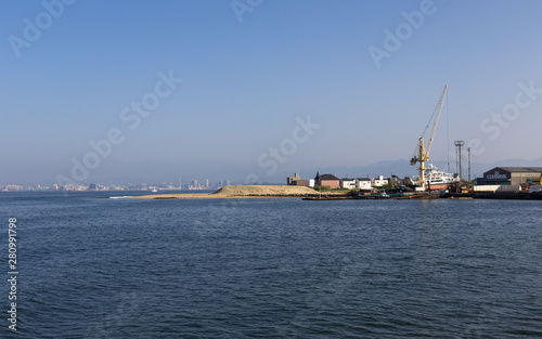 Saitozaki Industrial Harbor with Buildings. Higashi, Fukuoka, Japan. Asia © unununius