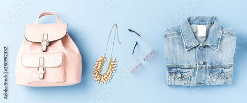Obraz na plátně Women’s clothes on blue background