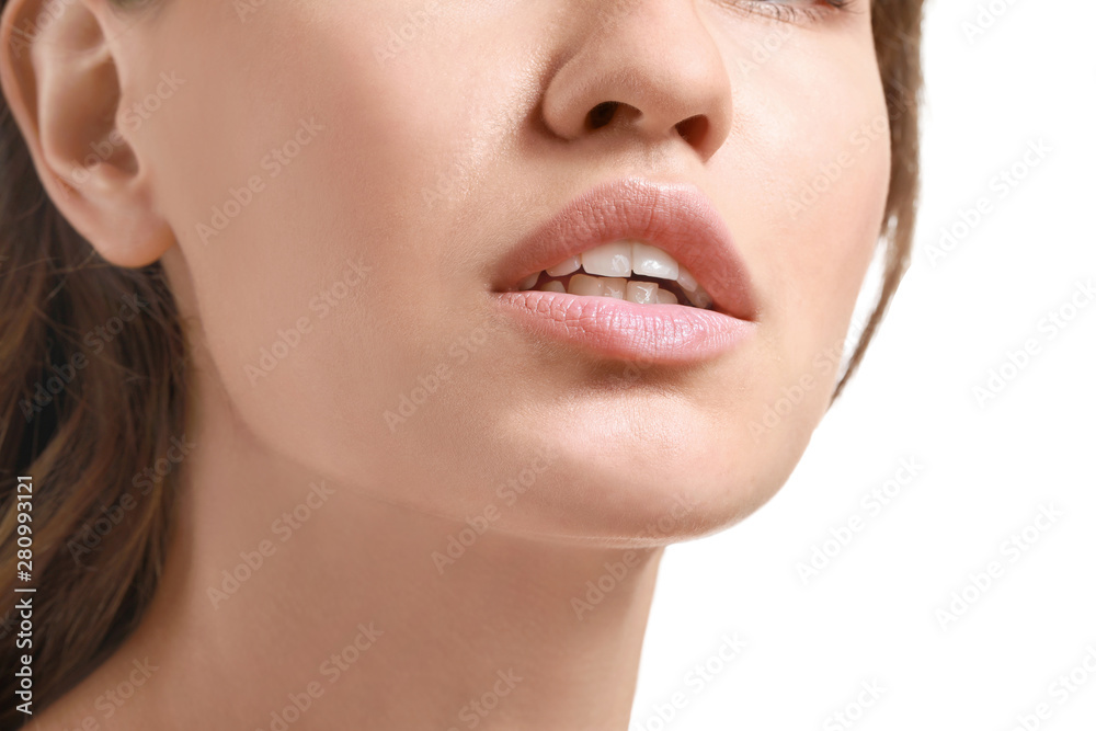 Young woman with beautiful lips on white background, closeup Young woman with beautiful lips on white background, closeup