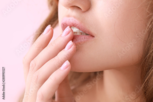 Young woman with beautiful lips  closeup