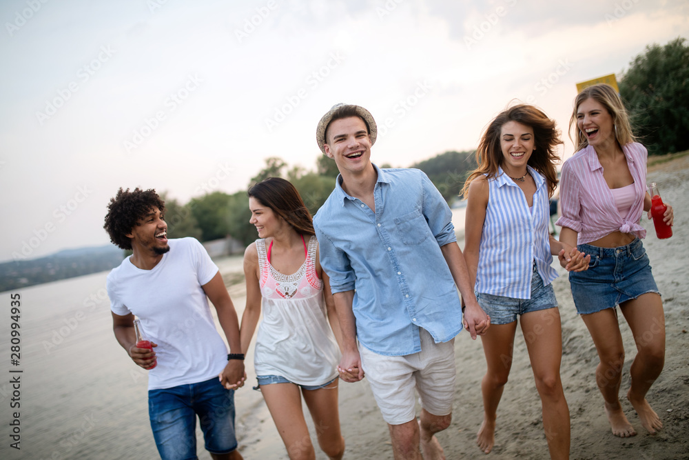 Happy people having fun in summer holidays. Friends, vacation, summer lifestyle and youth concept Happy people having fun in summer holidays. Friends, vacation, summer lifestyle and youth concept