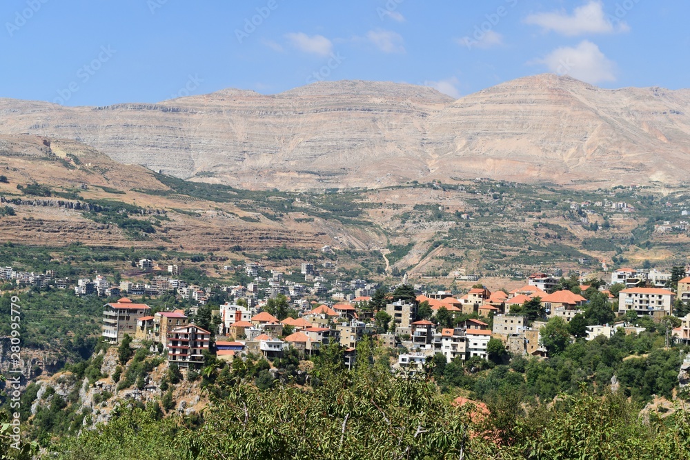 overview of the village of Bcharre with houses built at the edge of the cliff of saints valley, mount Lebanon, Lebanon