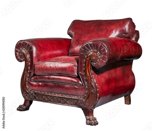 antique red leather arm chair carved legs isolated photo