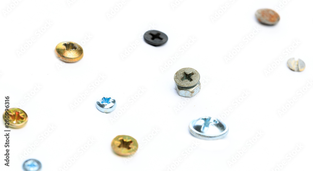 Screw heads, nuts, rivets isolated on white. Screw heads, nuts, rivets isolated on white.
