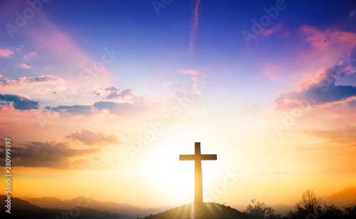 Canvas Print Christmas concept: The cross on mountain sunset background
