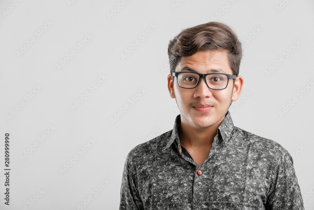 Indian / Asian Collage boy in formal dress and wearing spectacles Indian / Asian Collage boy in formal dress and wearing spectacles