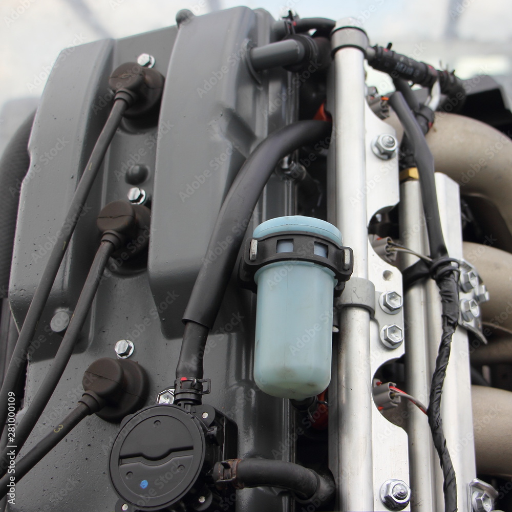 Rear side of boat transom four stroke 4 cylinder fuel injection