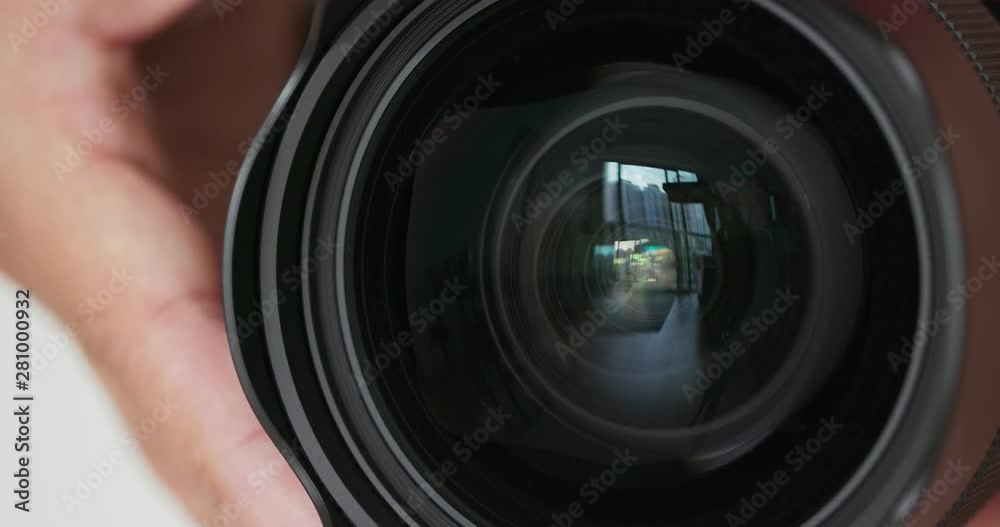 Taking photo by changing aperture on camera lens