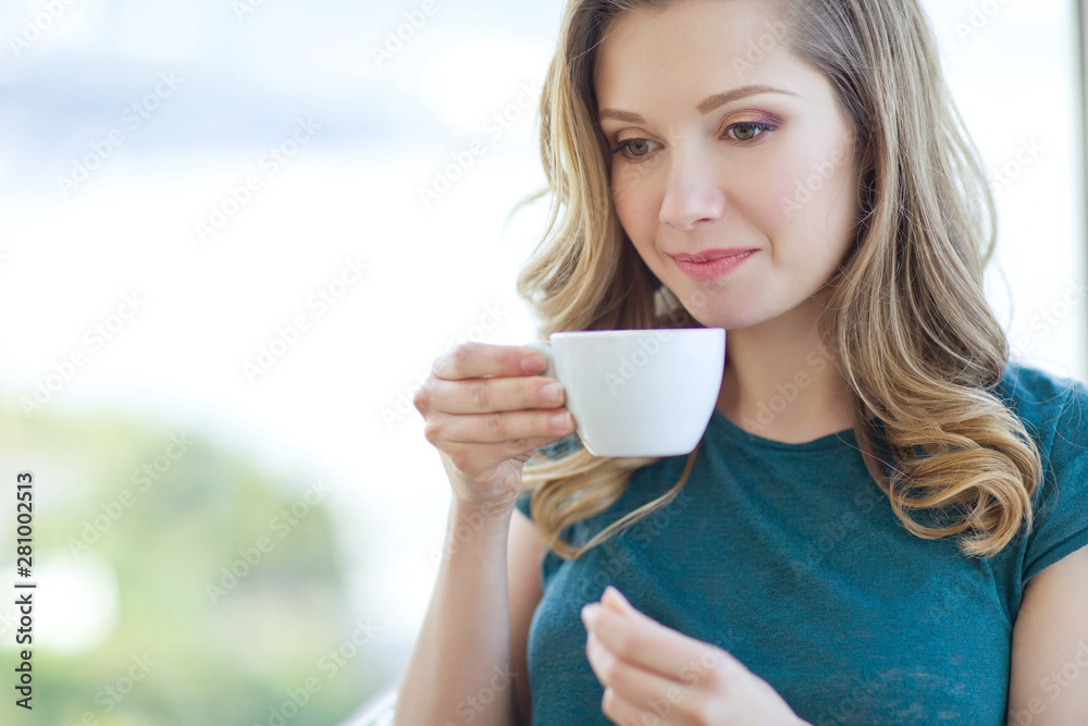 Woman drinking coffee. Woman drinking coffee.
