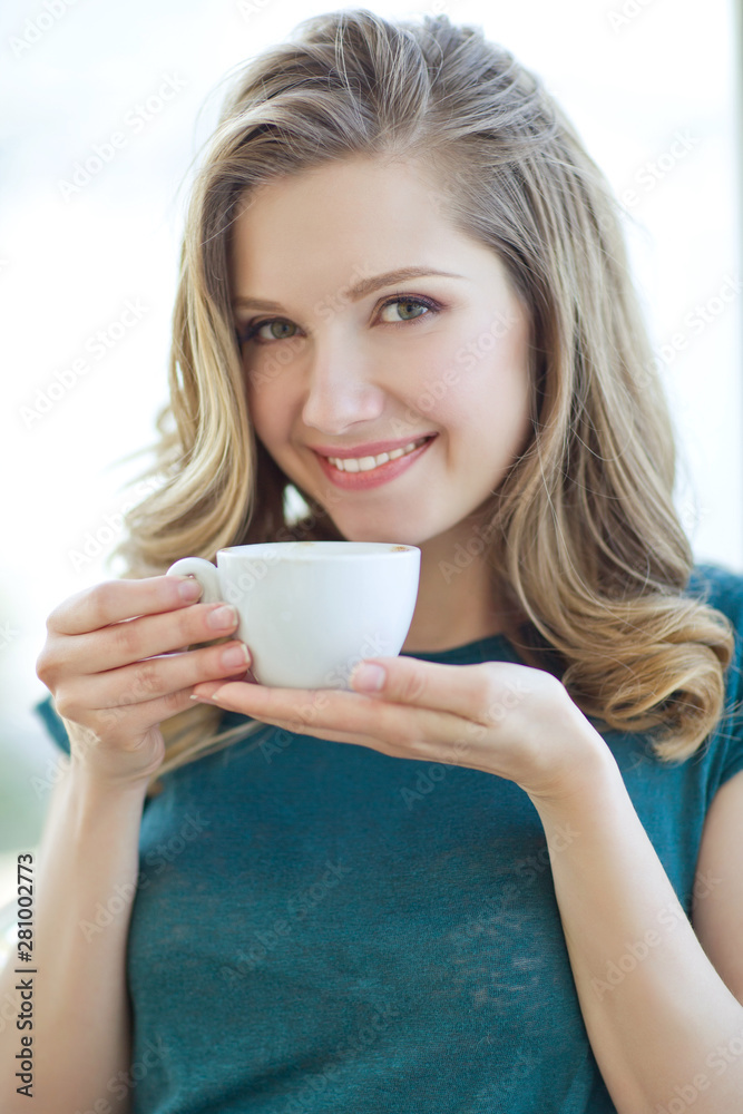Woman drinking coffee. Woman drinking coffee.