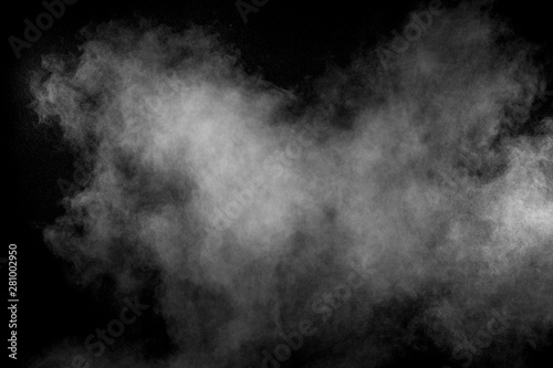 White talcume powder explosion on black background. White dust splashing. © Pattadis