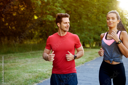 Young couple talking during morning running