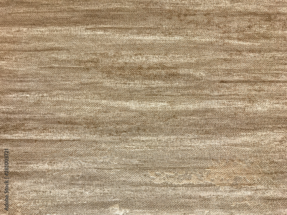 Texture of brown wallpaper with a pattern. Beige paper background. Texture of brown wallpaper with a pattern. Beige paper background.
