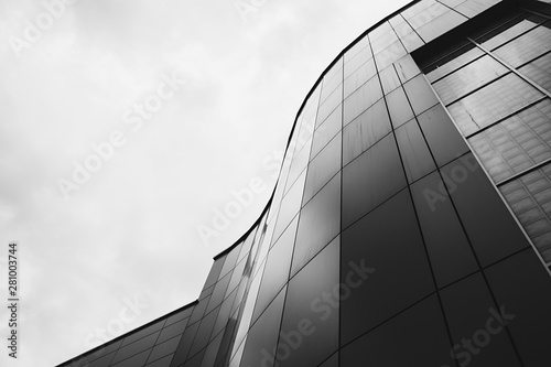 modern office building with a curved facade. black and white image