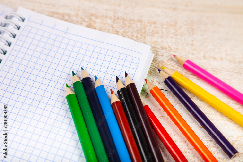 Obraz premium Items for the school on a wooden table.