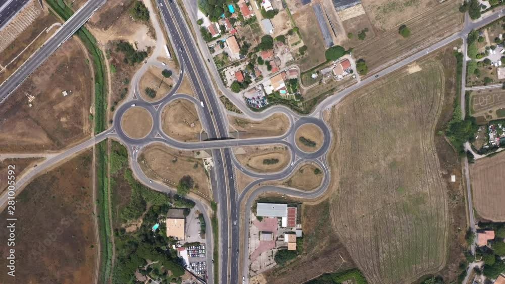 Roundabout patterns aerial top shot highway roads traffic France south Montpellier Roundabout patterns aerial top shot highway roads traffic France south Montpellier
