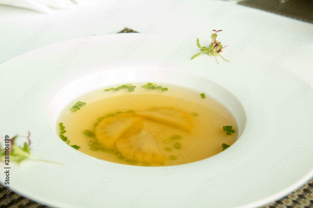 delicious clear soup on white bowl delicious clear soup on white bowl