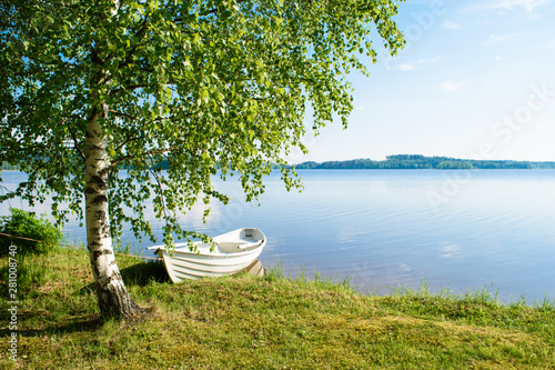 White boat on the lake.