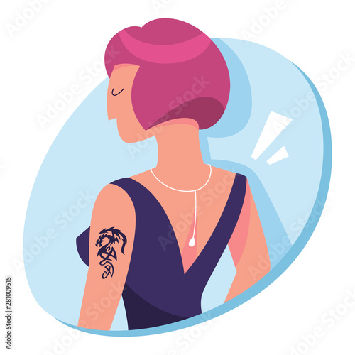 Happy woman with tattoo on the shoulder