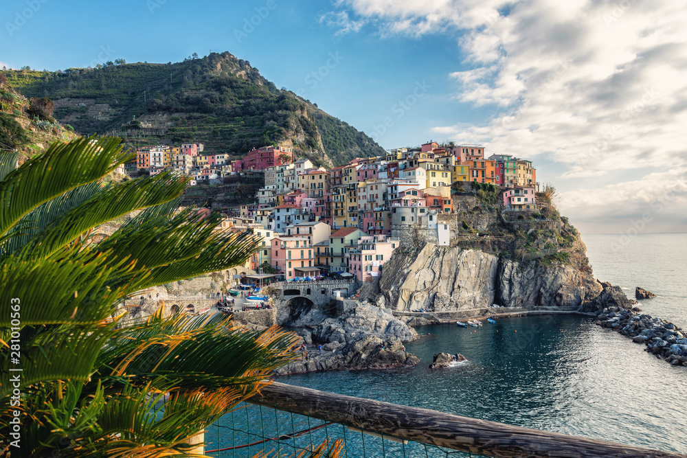 view of manarola in cinque terre italy. The best panorama of Italy. Manarolla. Ligurian coast. Cinque Terre National Park. Stone path to the sea. Medieval town on a rock by the sea.