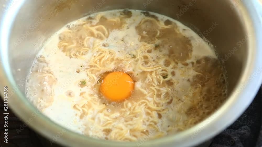 Boiling ramen noodles in pot, Japanese food Boiling ramen noodles in pot, Japanese food